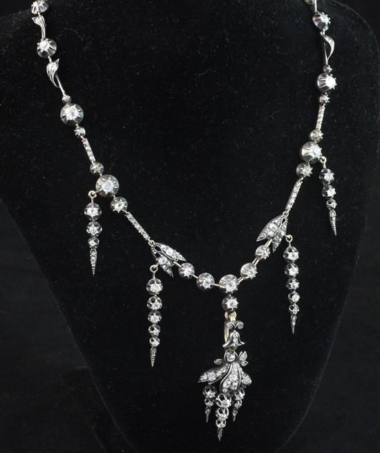 A 19th century French 18ct white gold and diamond drop pendant necklace, 15in.